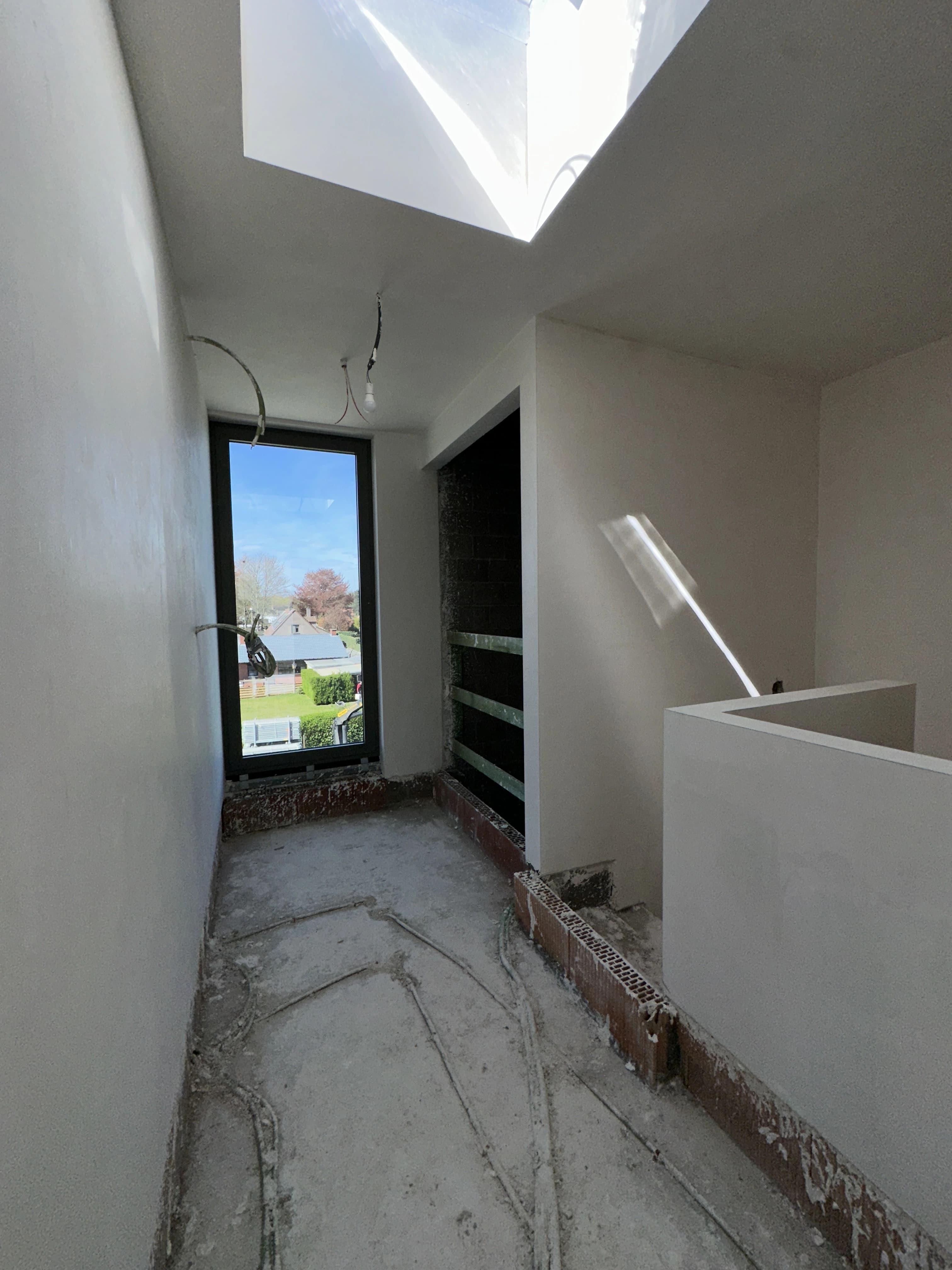 Binnenpleisterwerken Residentie Vennenpark Lommel — foto 9