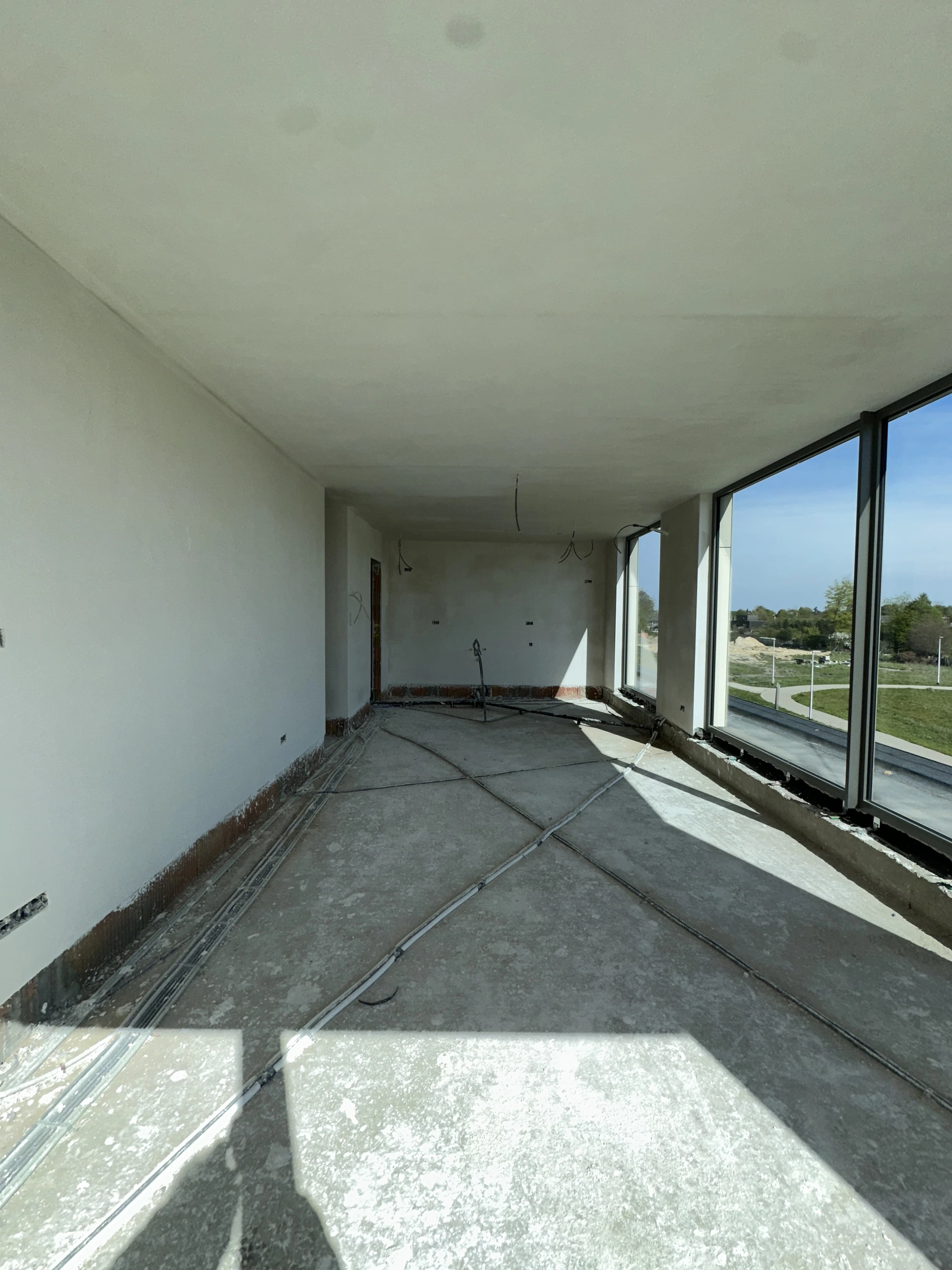 Binnenpleisterwerken Residentie Vennenpark Lommel — foto 3