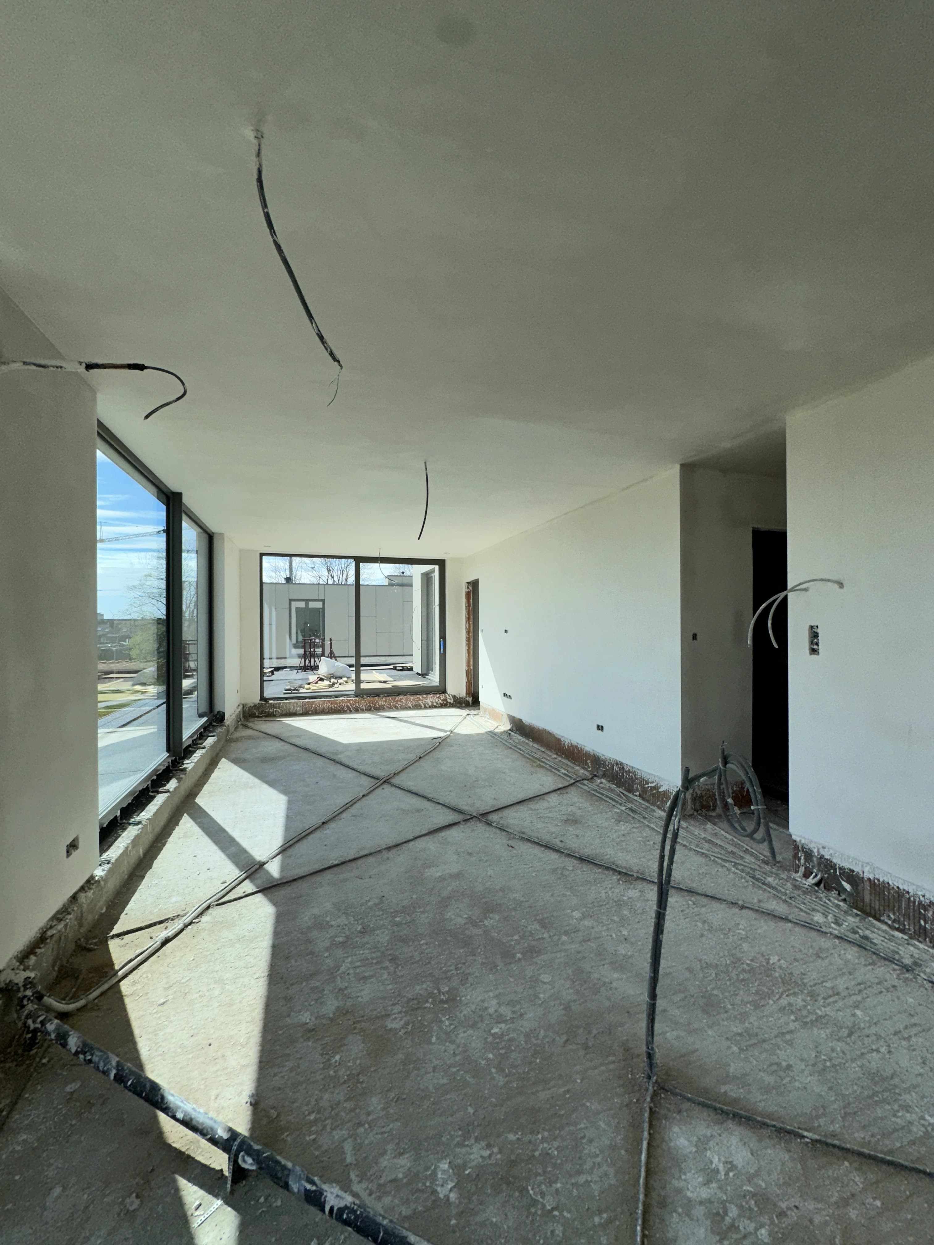 Binnenpleisterwerken Residentie Vennenpark Lommel — foto 5